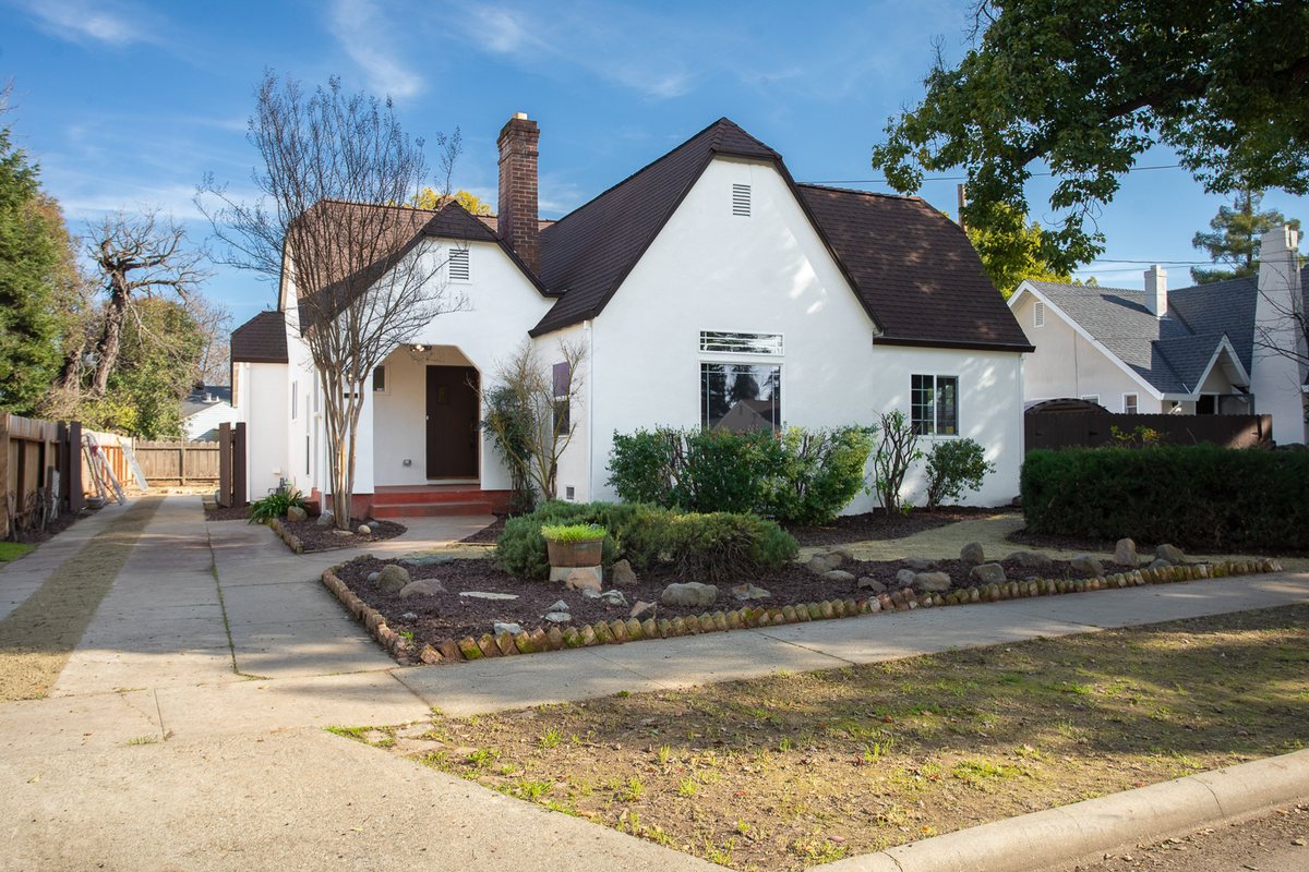 Olive Street after Dottco rehabilitation: fresh exterior, new roof, new landscaping